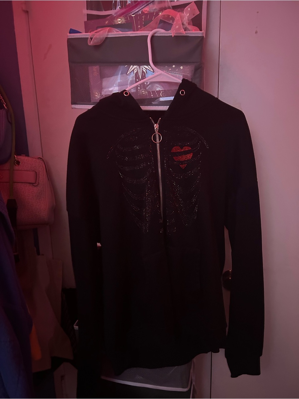 ROMWE Black Zip Hoodie with Rhinestone Ribcage and Red Heart Accent